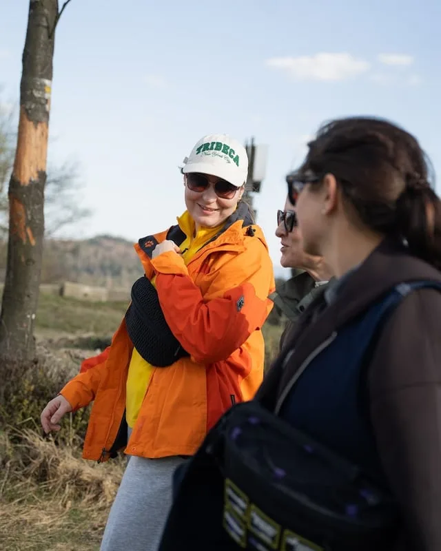 Two teammates chatting on the trail